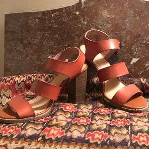 2 pair of leather sandals, one with 3” tapered heel, one with 2 1/2” block heel.